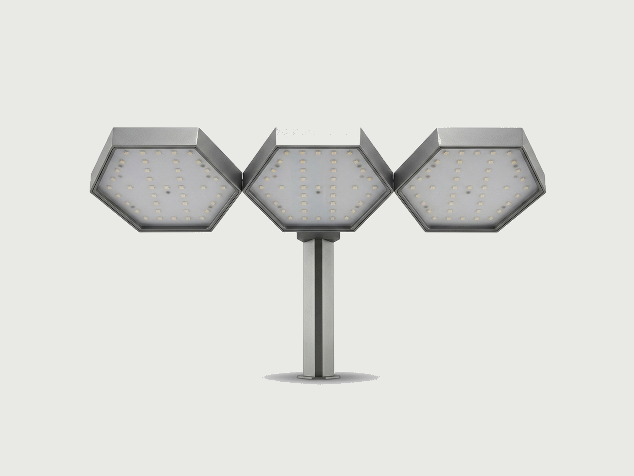 The AI Ponics hexagonal full-spectrum LED grow-light panels on a central stand